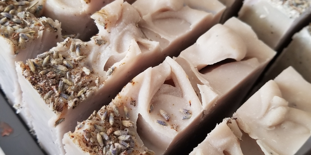 Lavender Deluxe Shea Butter soap with lavender buds on top upclose